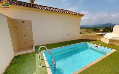 Swimming pool of Attic for sale in Oliva  with Air Conditioner and Terrace
