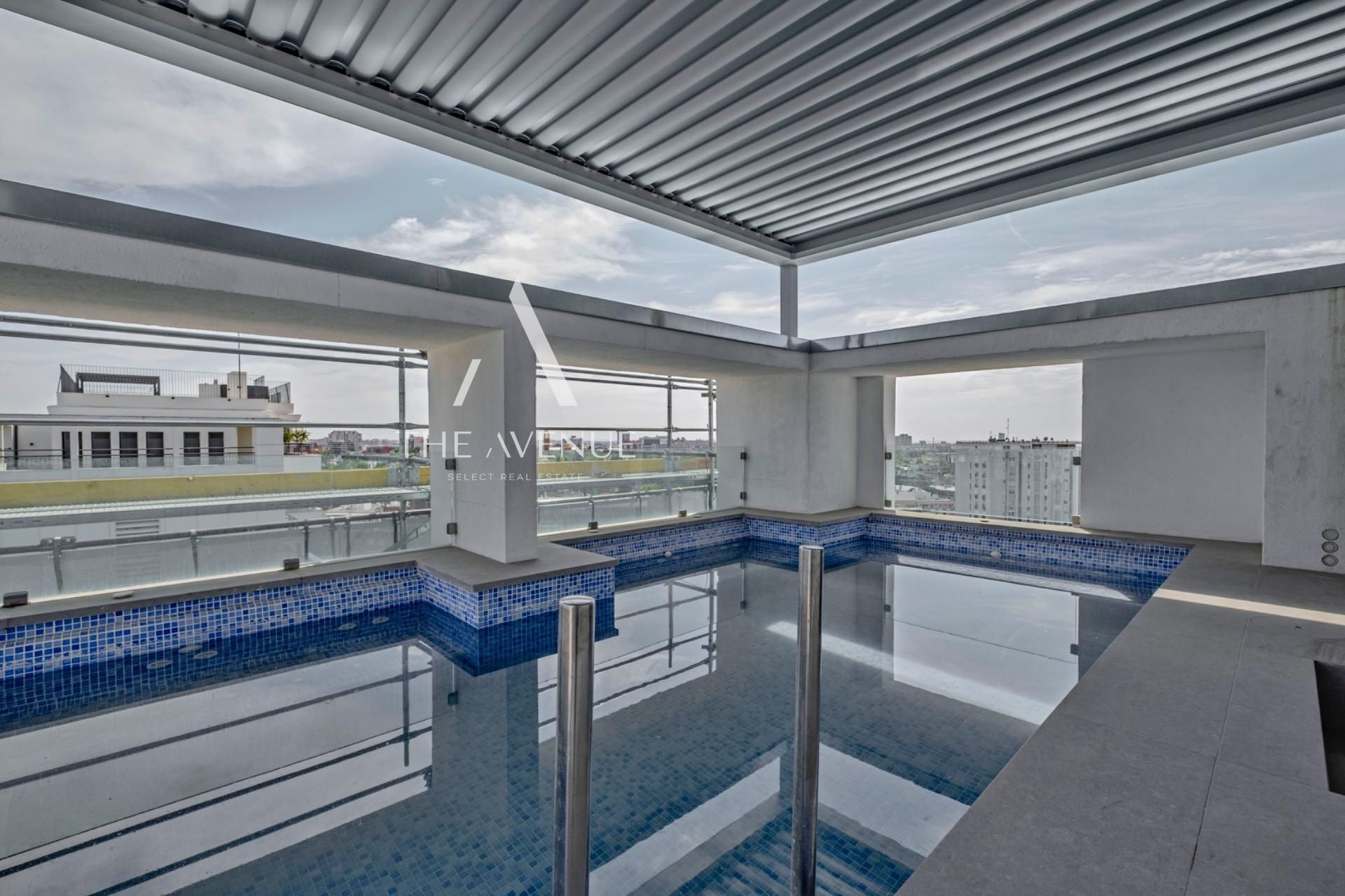 Swimming pool of Attic for sale in  Madrid Capital  with Air Conditioner, Heating and Terrace