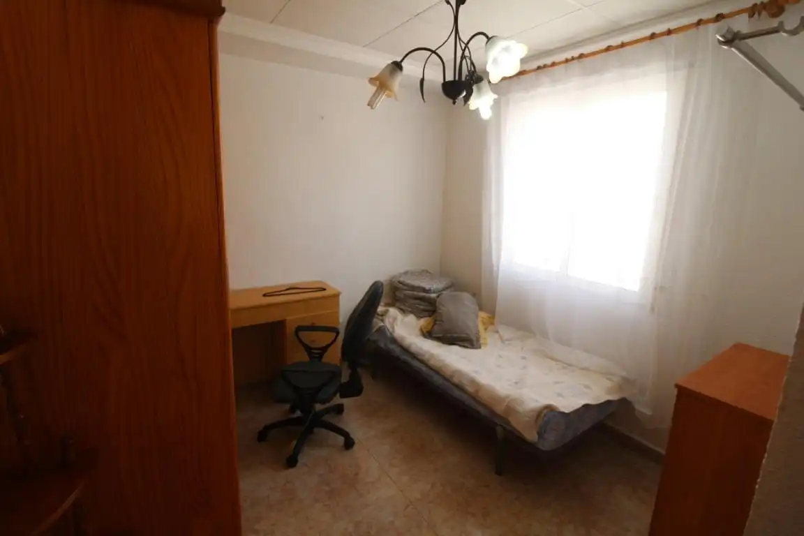Habitación de Casa adosada en venta en Torrevieja con Aire acondicionado, Jardín privado y Terraza