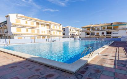 Swimming pool of Flat for sale in Santa Pola  with Air Conditioner, Terrace and Furnished