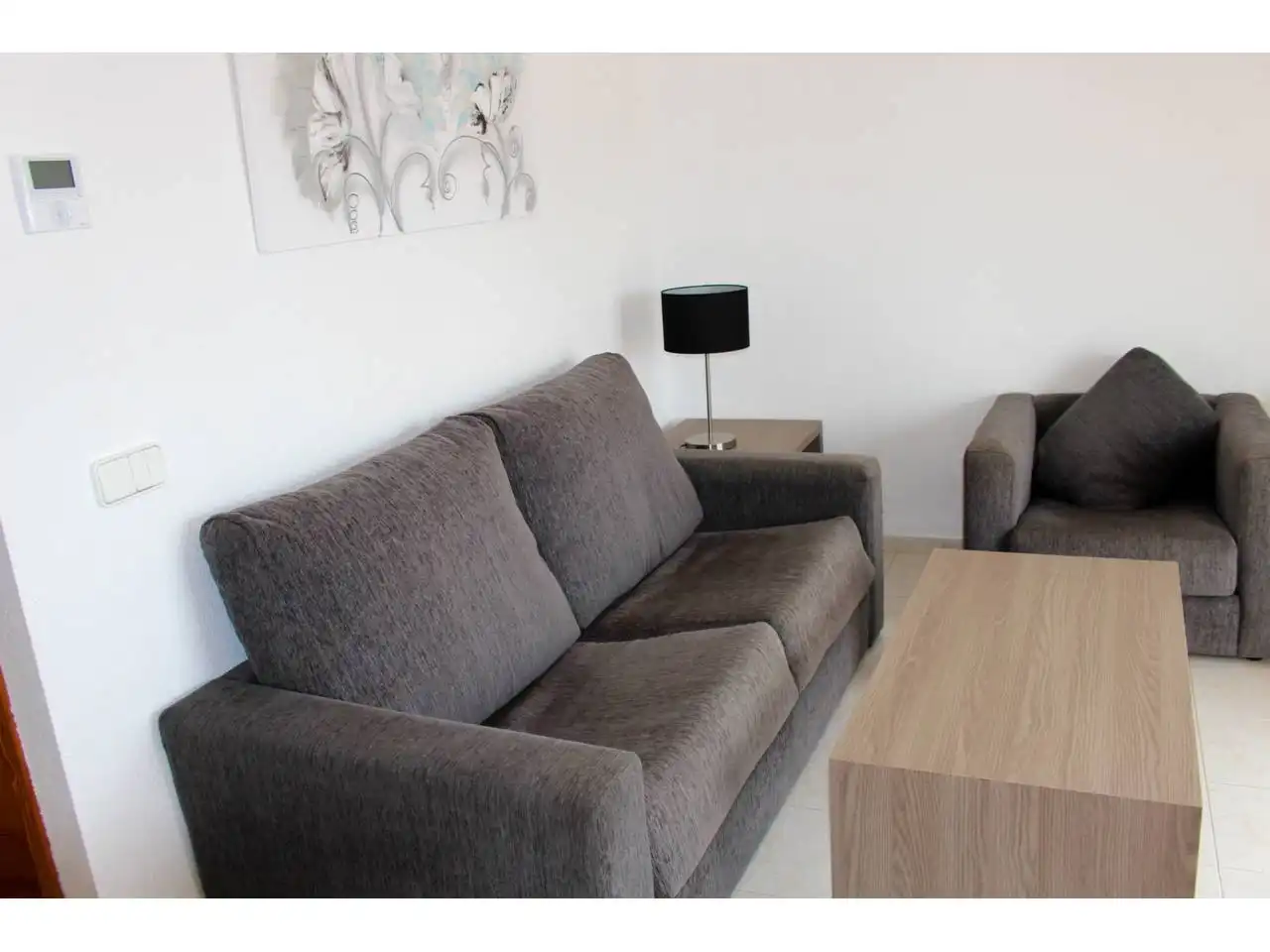 Wohnzimmer von Einfamilien-Reihenhaus zum Verkauf in Calpe / Calp mit Klimaanlage, Terrasse und Möbliert
