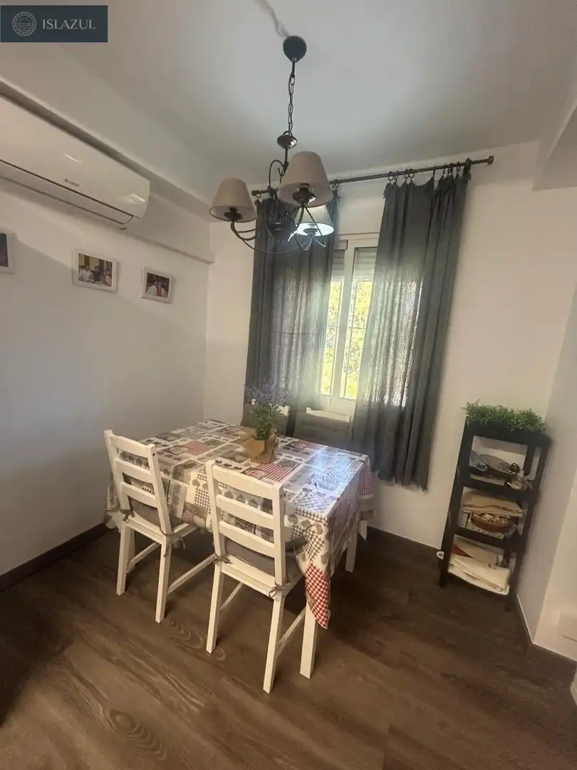 Menjador de Apartament en venda en Isla Cristina amb Aire condicionat, Jardí privat i Terrassa