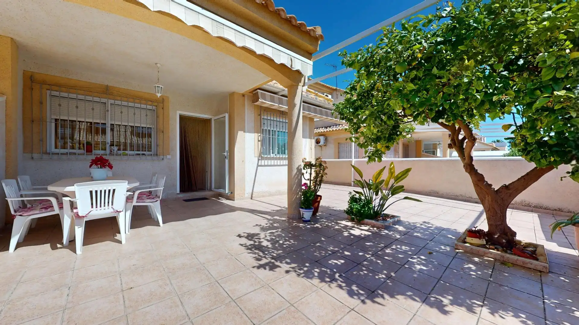 Jardín de Casa adosada en venta en Pilar de la Horadada con Aire acondicionado, Jardín privado y Terraza