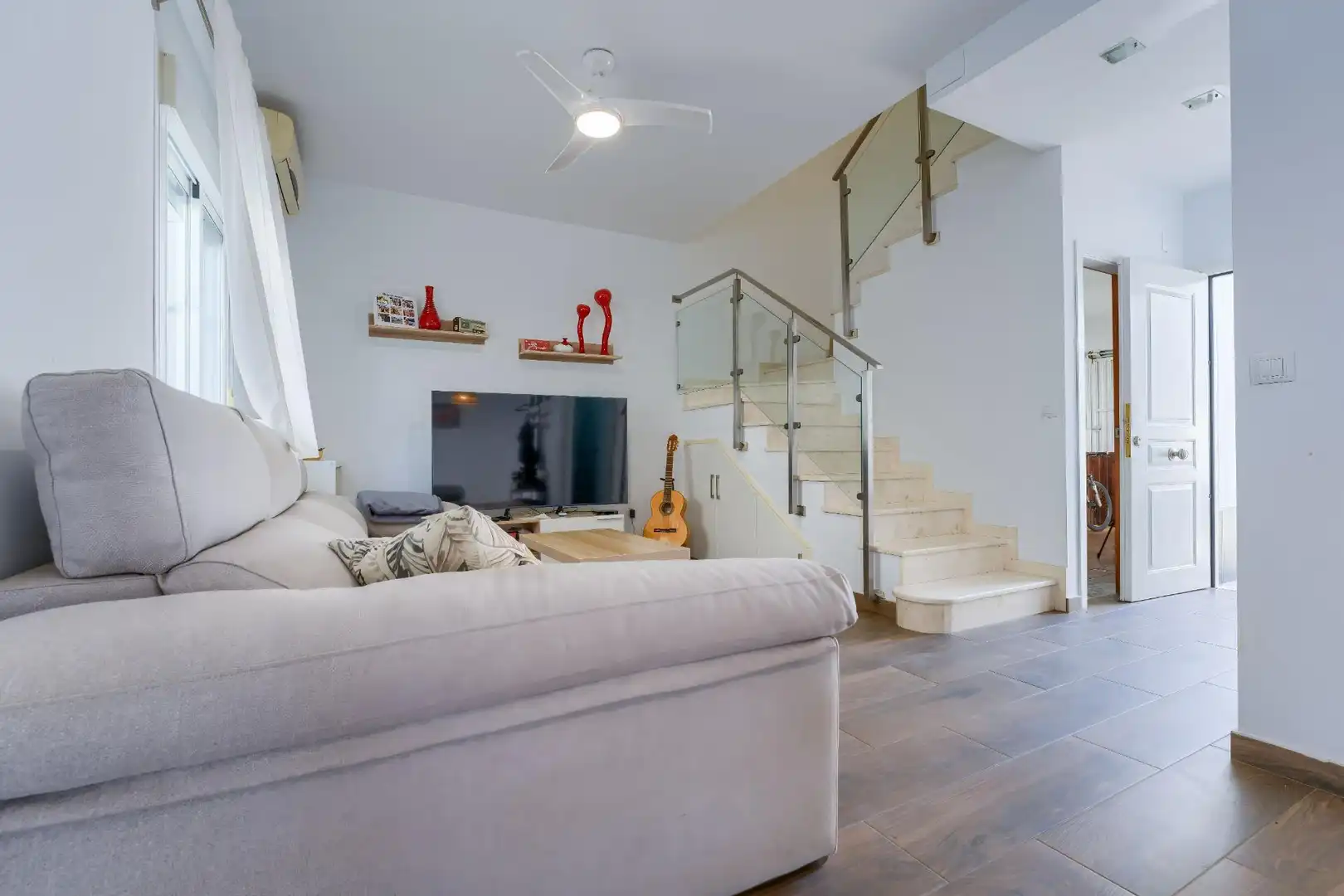 Sala de estar de Casa adosada en venta en Umbrete con Aire acondicionado, Terraza y Trastero
