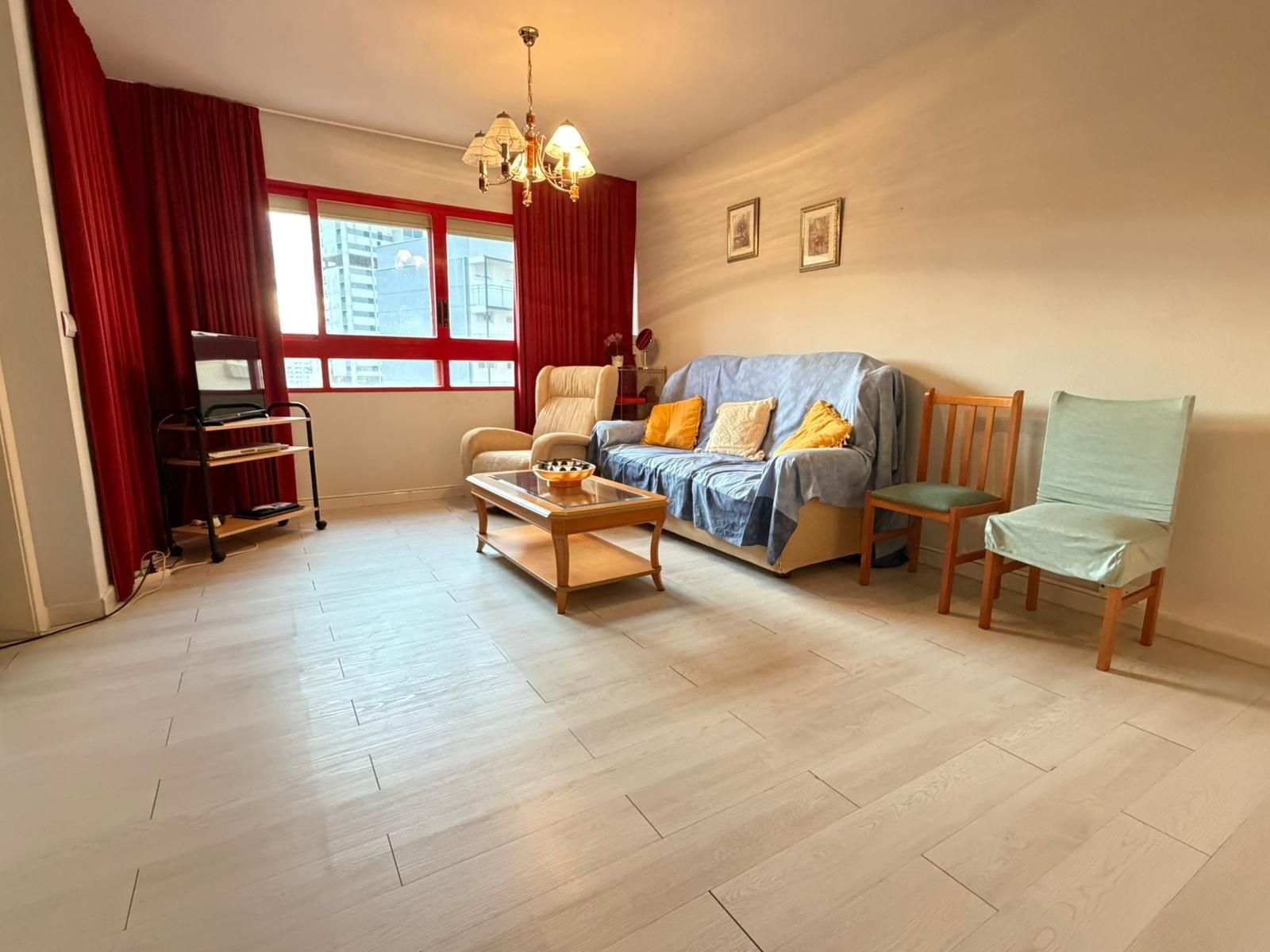 Sala de estar de Apartamento en venta en Benidorm con Jardín privado, Terraza y Piscina comunitaria