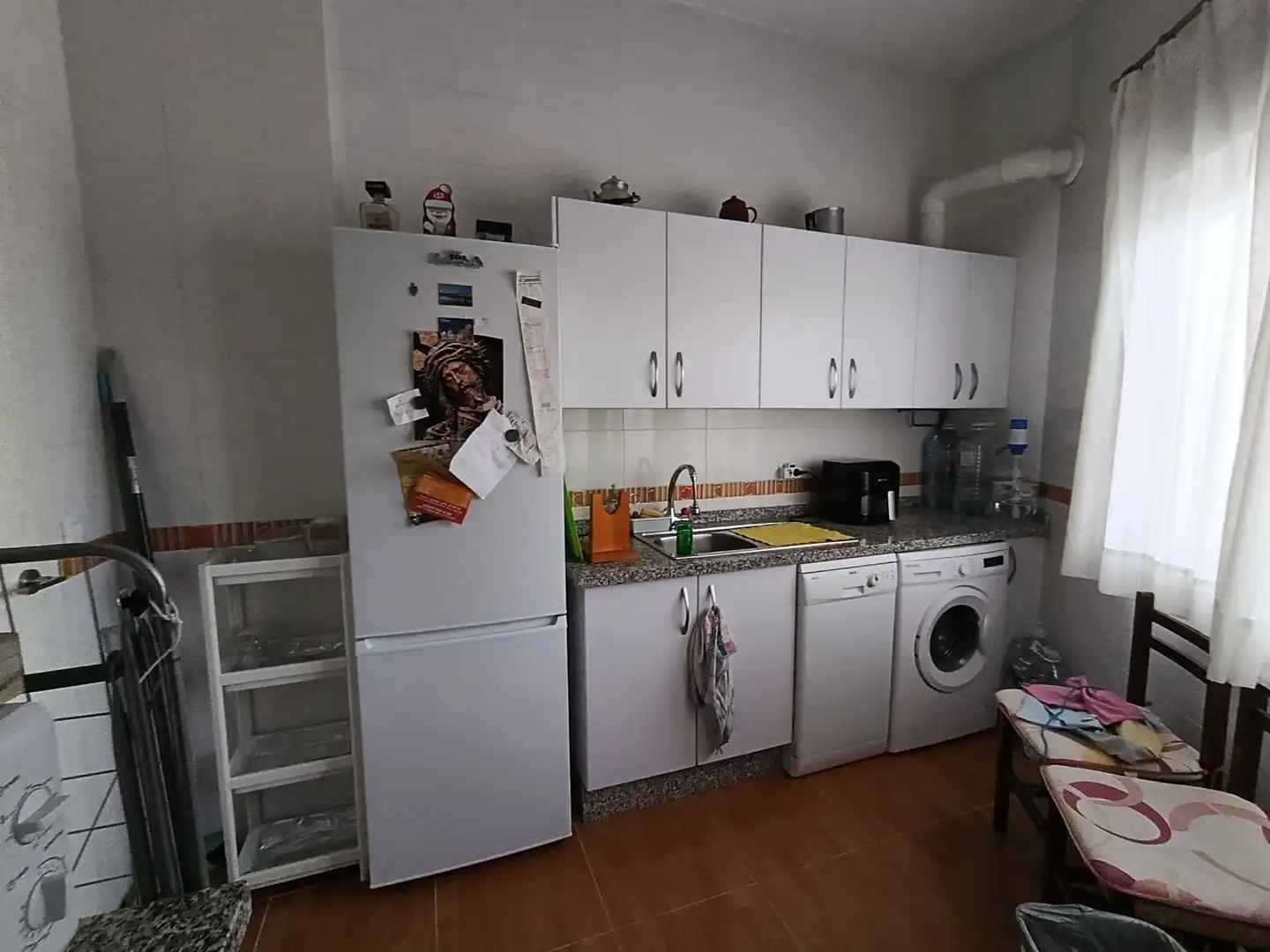 Küche von Erdgeschoss zum Verkauf in Punta Umbría mit Möbliert, Ofen und Waschmaschine