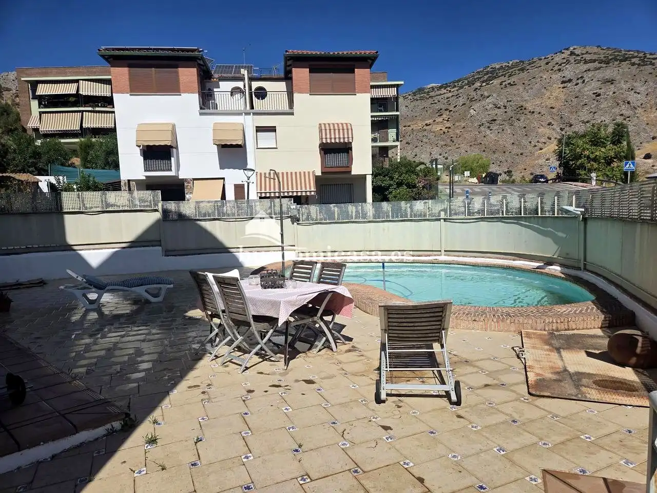 Piscina de Casa adosada en venda en Jaén amb Aire condicionat, Calefacció i Terrassa