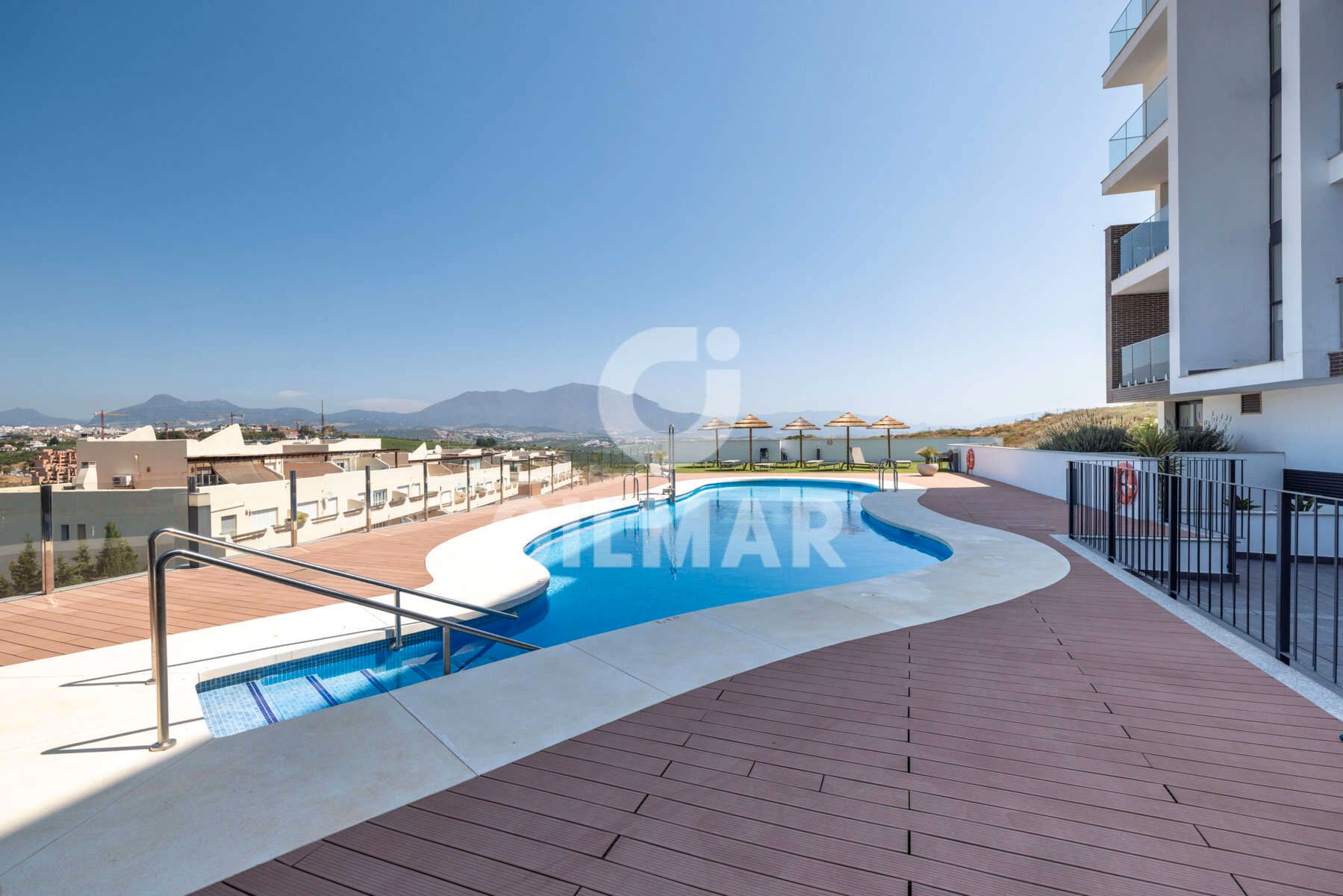 Swimming pool of Attic for sale in Manilva  with Air Conditioner, Storage room and Community pool