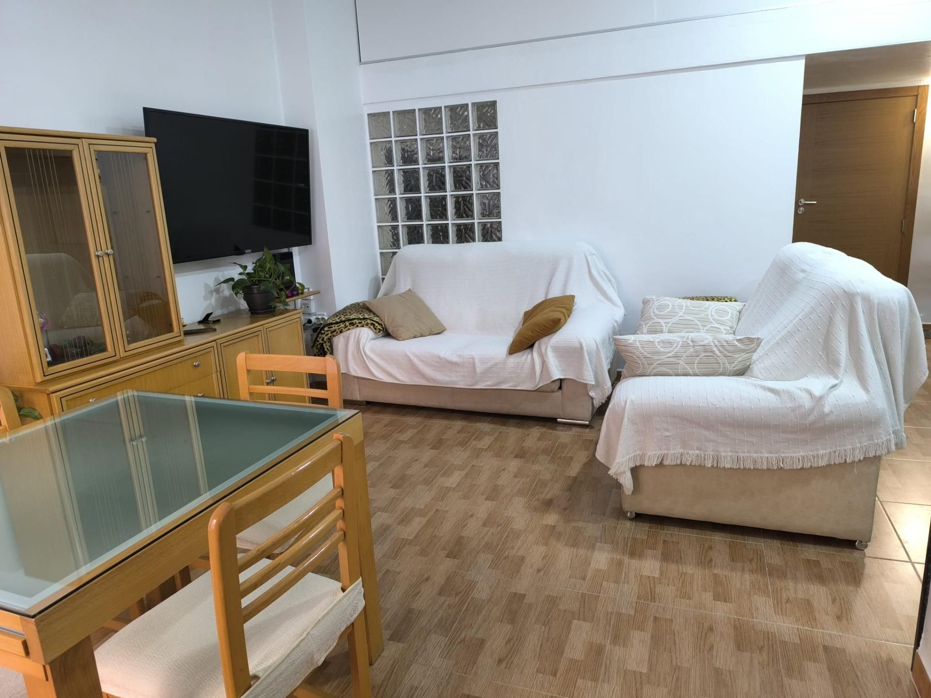 Living room of Planta baja for sale in L'Alcúdia  with Heating, Terrace and Balcony