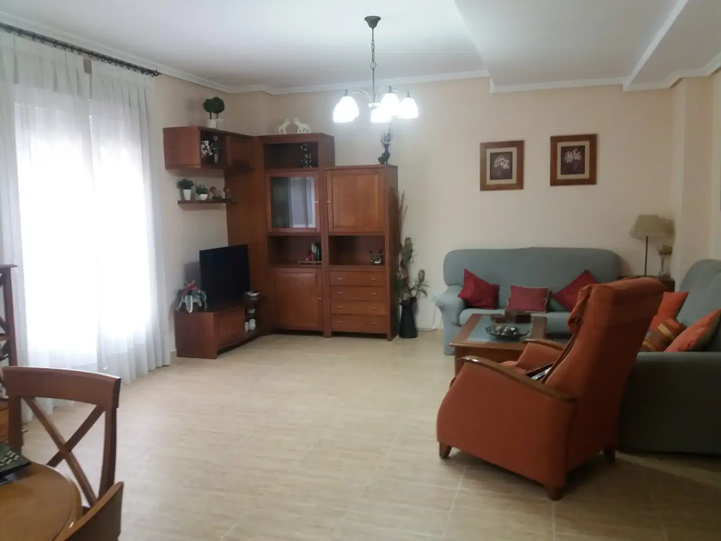 Sala de estar de Casa adosada en venta en Herencia con Calefacción, Terraza y Amueblado