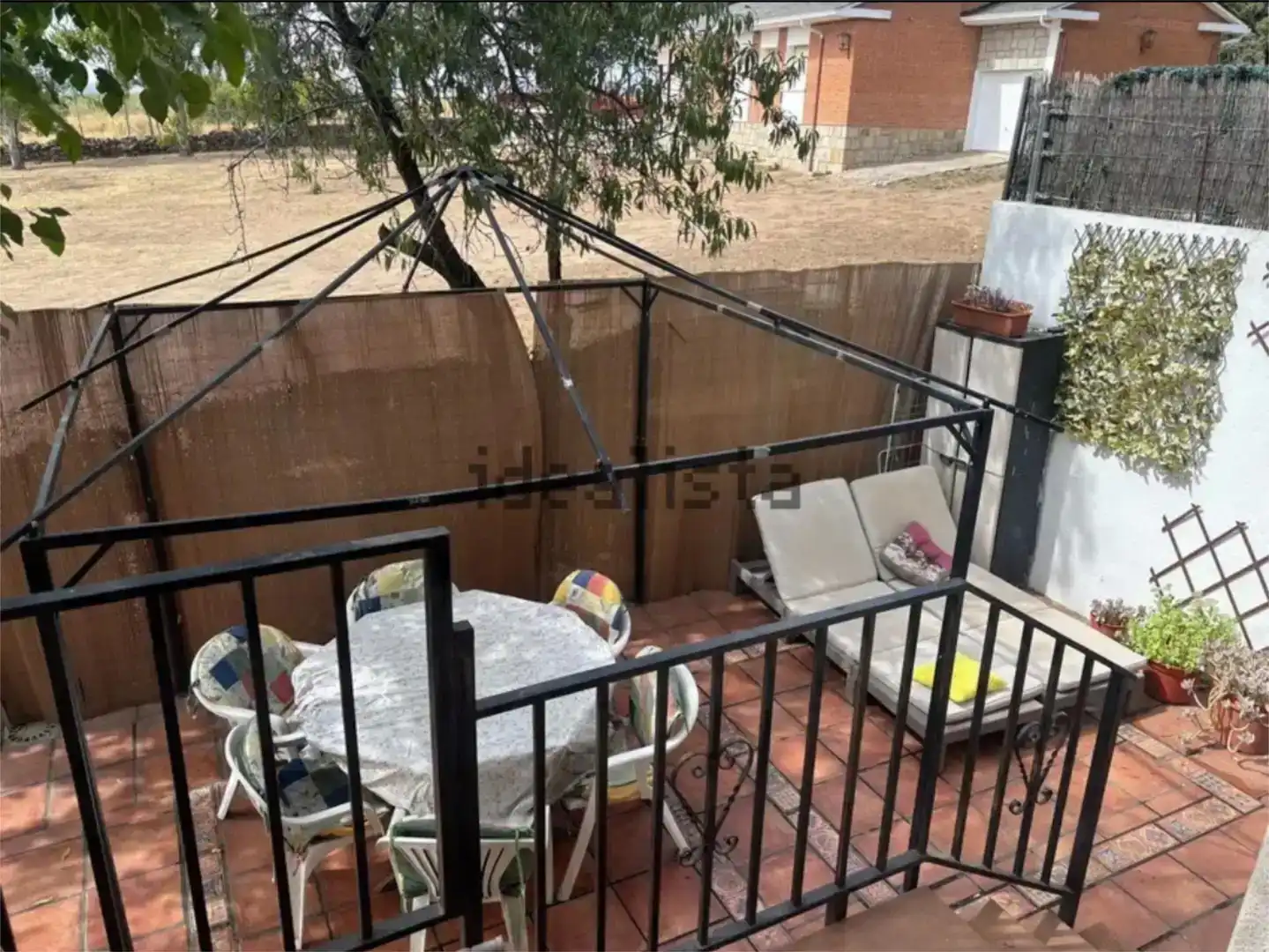 Terrassa de Casa o xalet en venda en Cabanillas de la Sierra amb Jardí privat, Piscina i Moblat