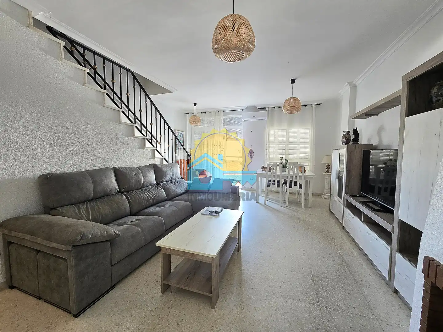 Sala de estar de Casa adosada en venta en Punta Umbría con Terraza, Balcón y Piscina comunitaria