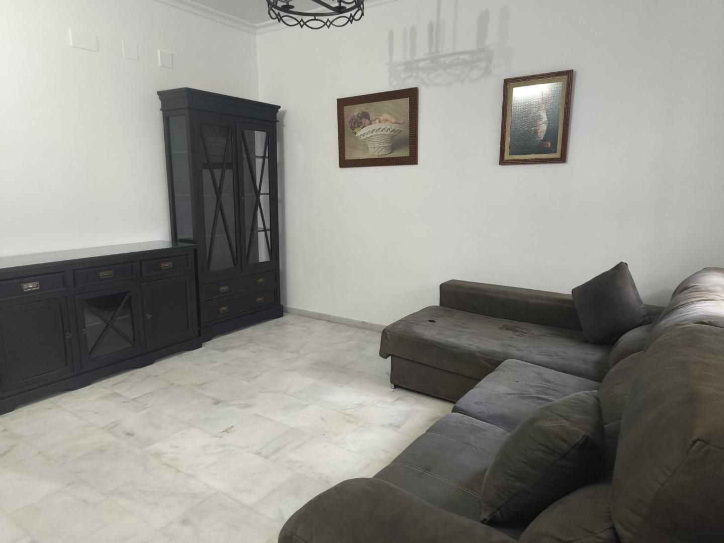 Sala d'estar de Casa adosada en venda en Mairena del Alcor