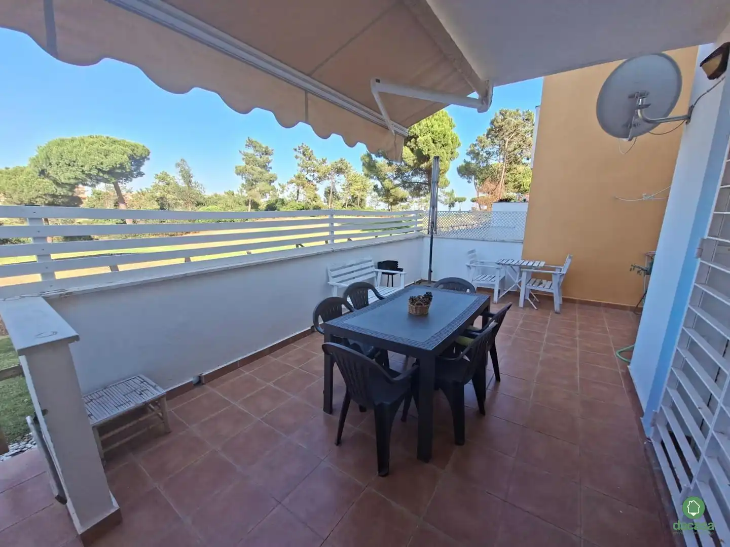 Terraza de Casa adosada de alquiler en Islantilla con Aire acondicionado, Piscina y Amueblado