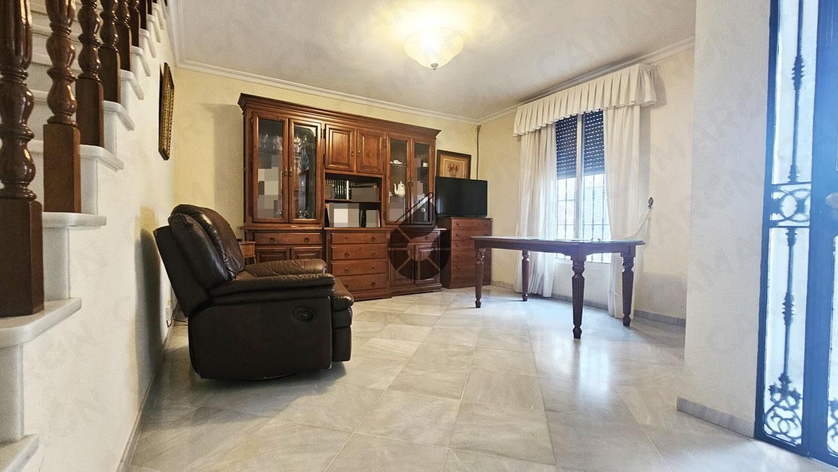 Sala d'estar de Casa o xalet en venda en La Puebla del Río amb Terrassa