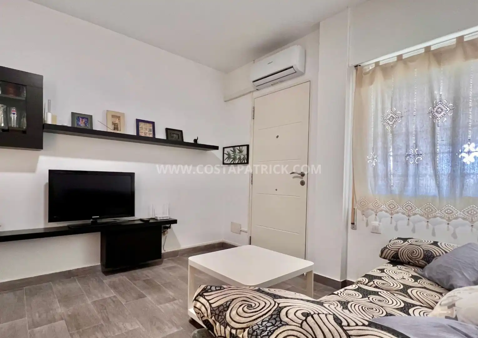 Sala de estar de Casa adosada de alquiler en Los Alcázares con Aire acondicionado, Calefacción y Jardín privado