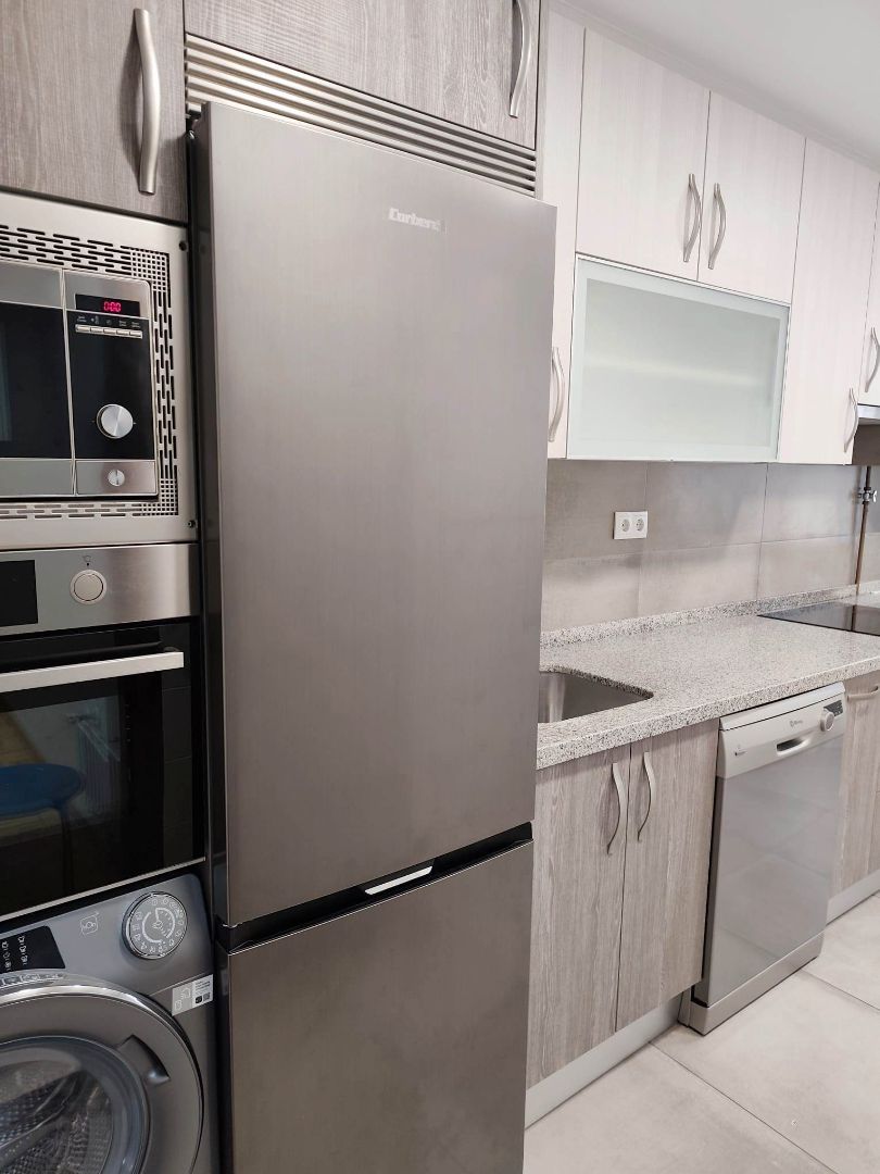 Kitchen of Flat to rent in Gijón   with Heating, Parquet flooring and Oven