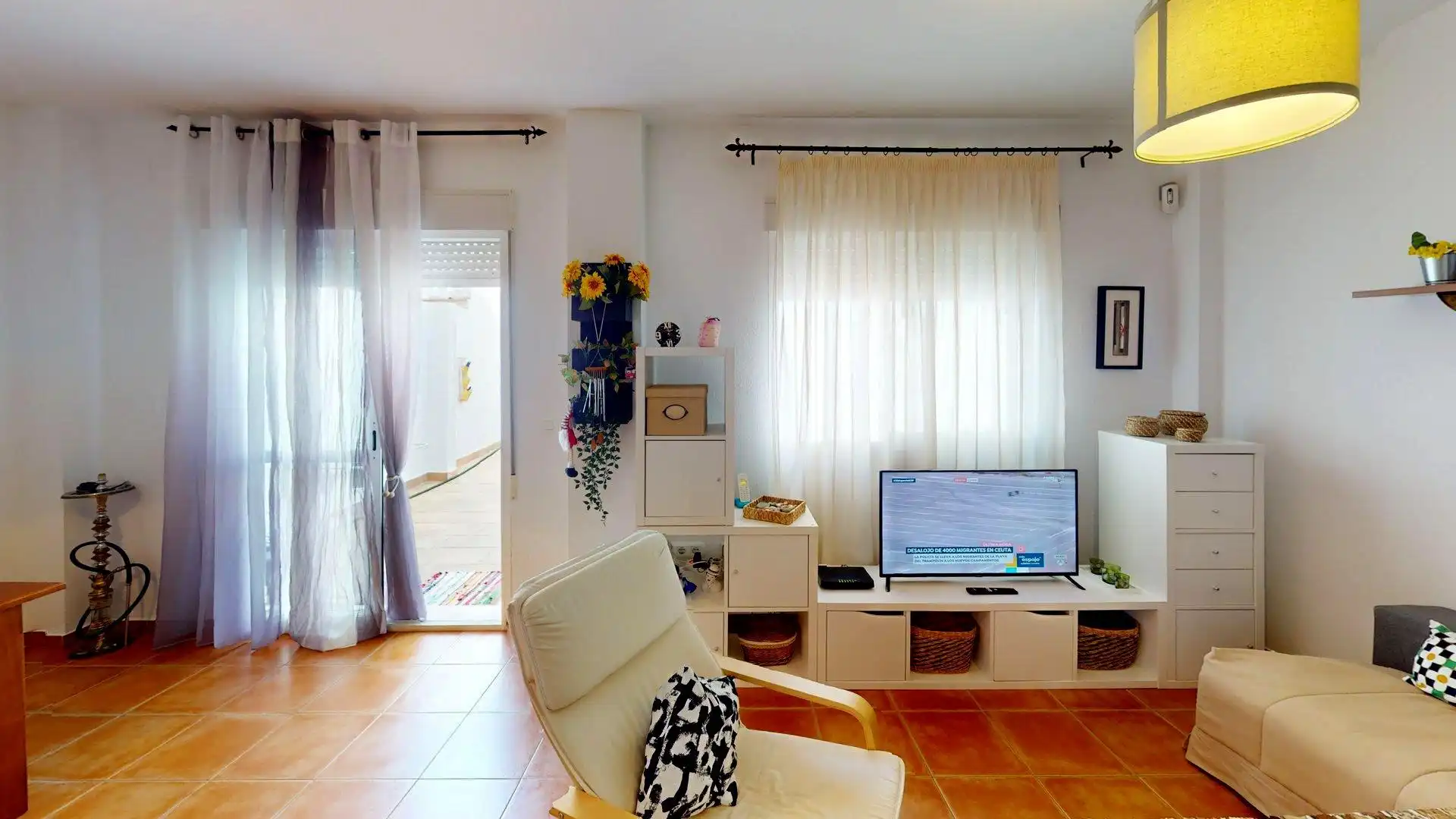 Sala d'estar de Casa adosada en venda en Cartaya amb Aire condicionat, Calefacció i Alarma