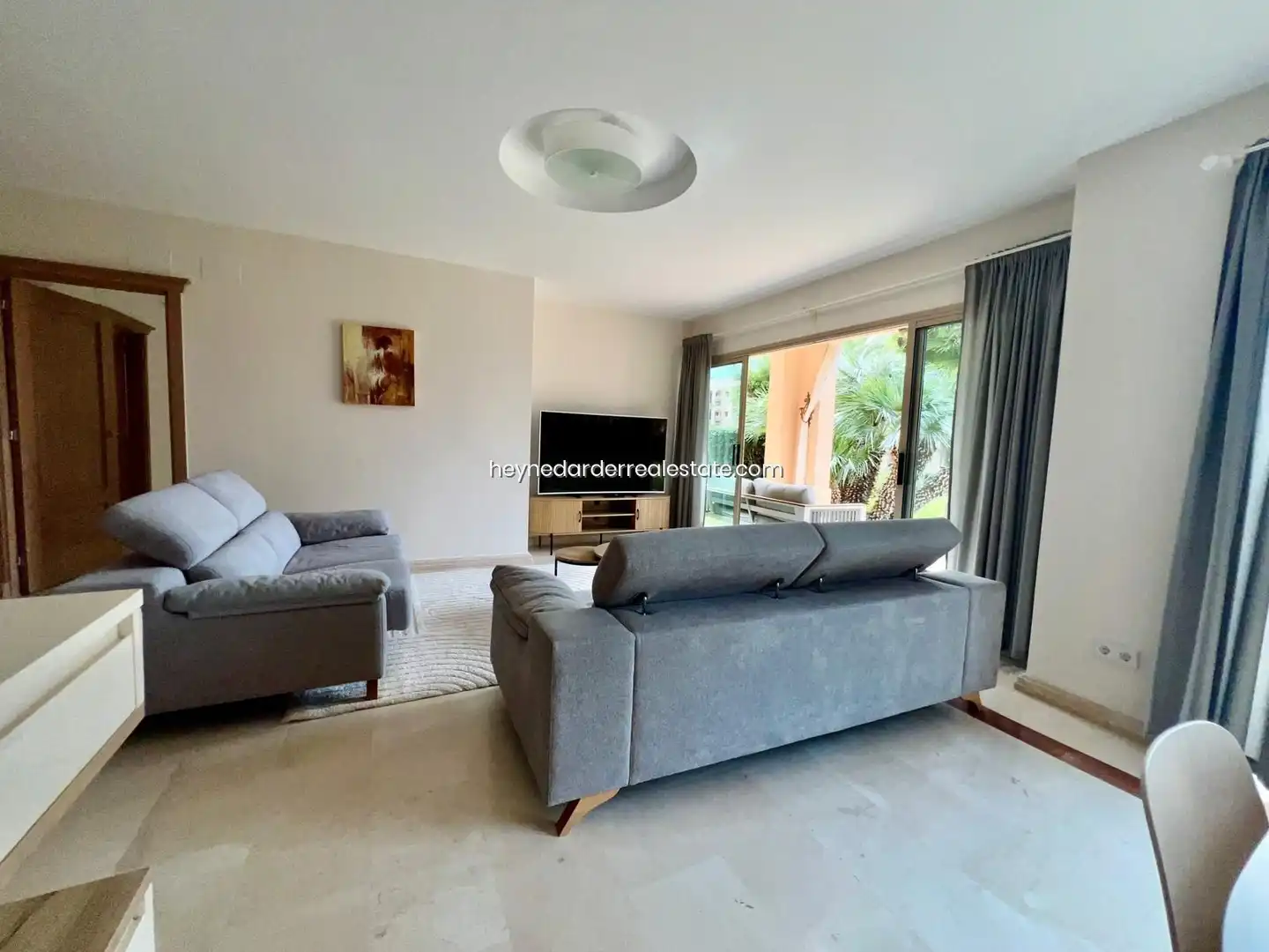 Sala d'estar de Apartament de lloguer en Calvià amb Aire condicionat, Jardí privat i Traster