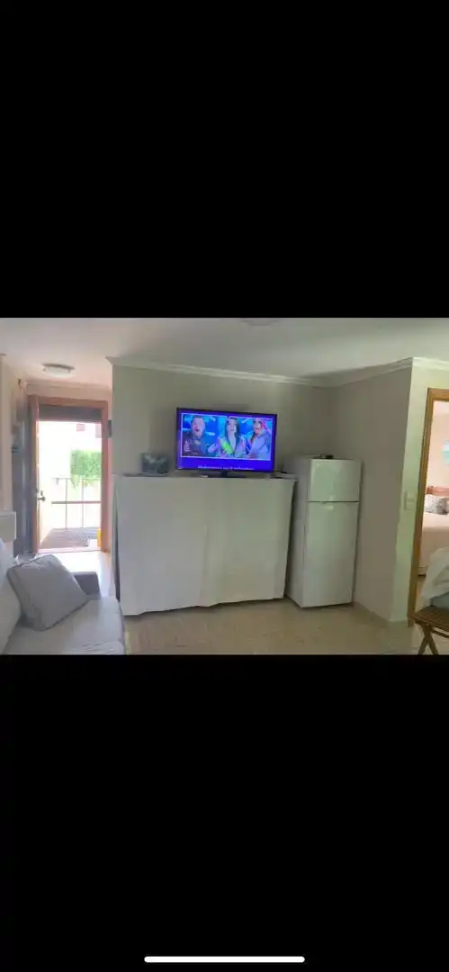 Sala d'estar de Apartament de lloguer en La Manga del Mar Menor amb Aire condicionat i Moblat