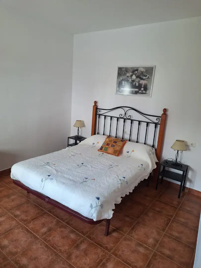 Dormitori de Apartament de lloguer en Úbeda amb Aire condicionat, Moblat i Rentadora