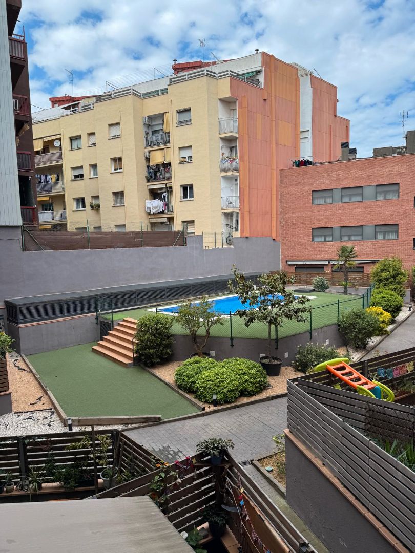 Swimming pool of Flat for sale in Badalona  with Air Conditioner, Heating and Parquet flooring