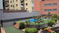 Swimming pool of Flat for sale in Badalona  with Air Conditioner, Heating and Parquet flooring