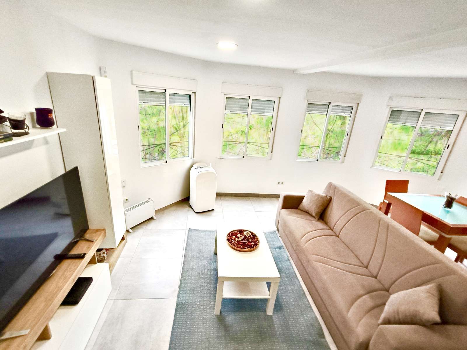 Sala de estar de Apartamento para compartir en  Barcelona Capital con Aire acondicionado, Terraza y Amueblado