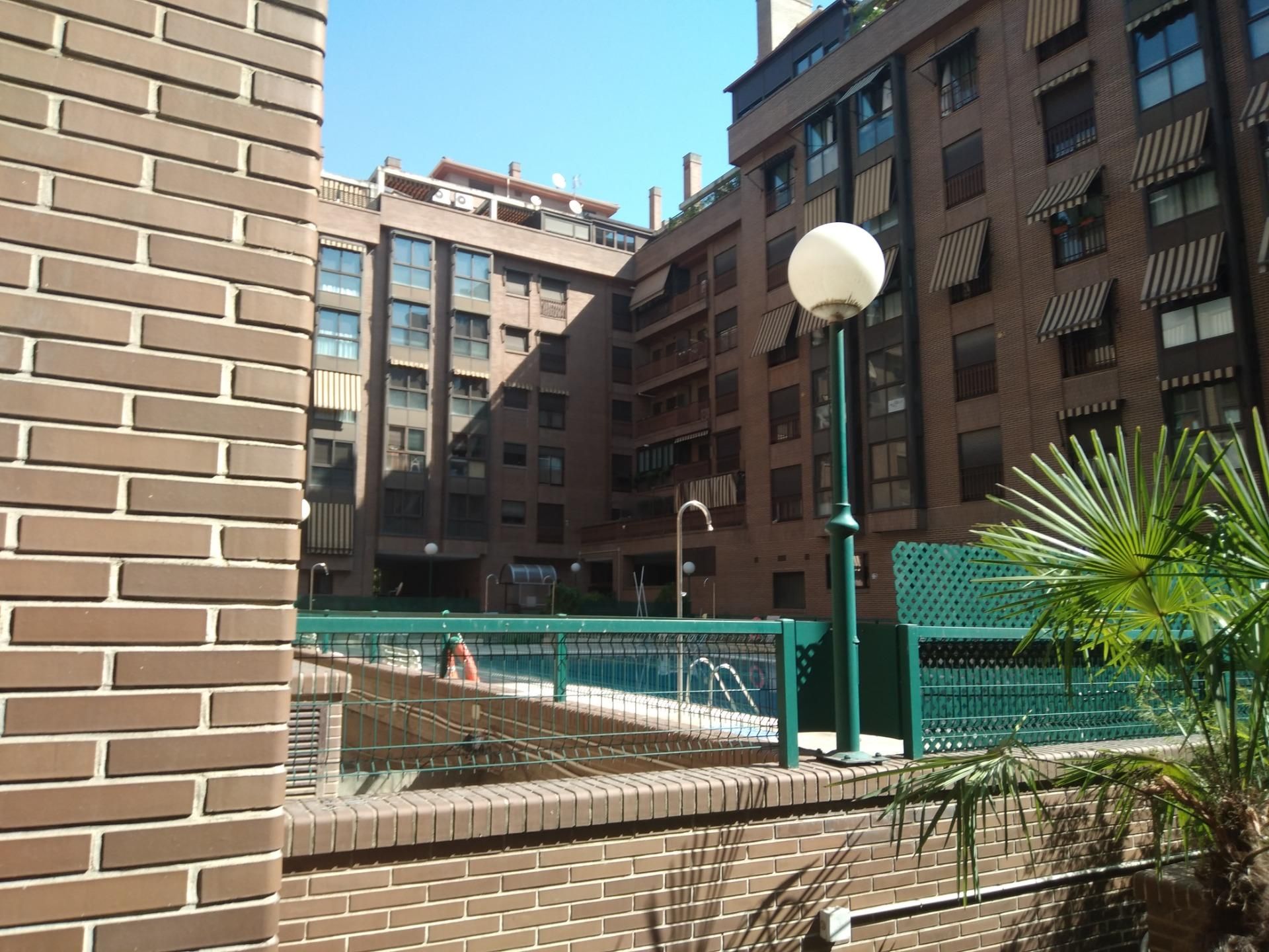 Swimming pool of Flat for sale in  Madrid Capital  with Heating, Private garden and Storage room
