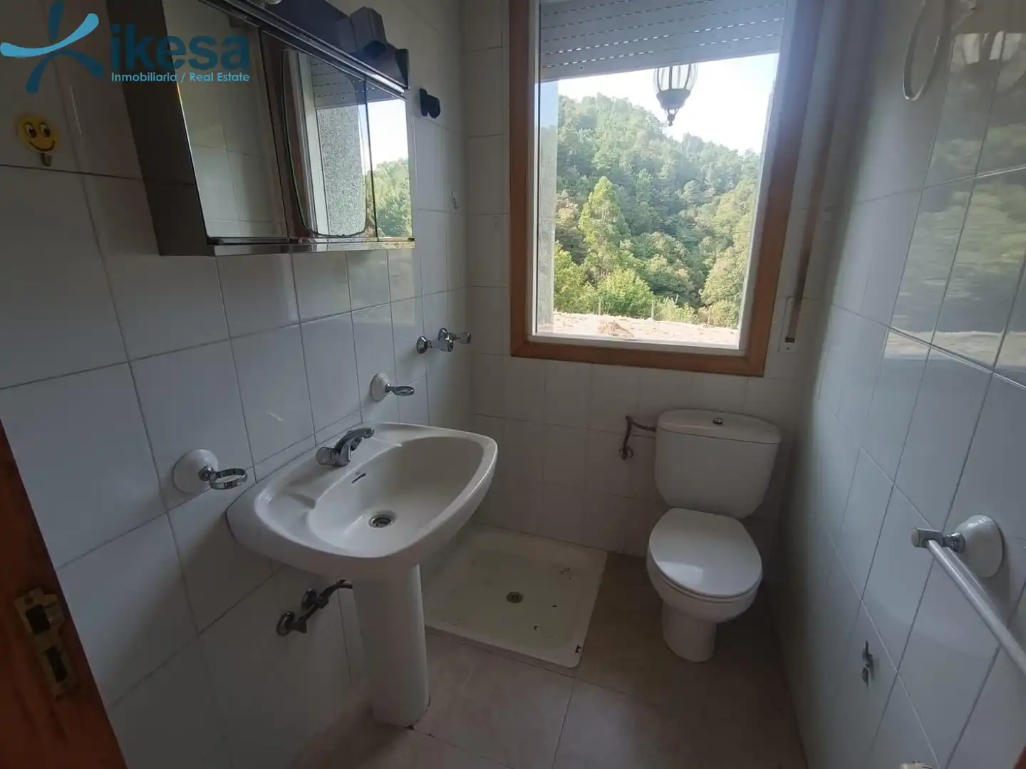 Bany de Casa o xalet en venda en Entrimo amb Jardí privat