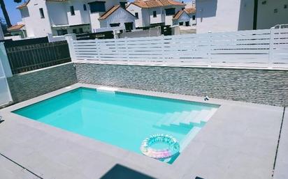 Swimming pool of Single-family semi-detached for sale in Alhaurín de la Torre  with Air Conditioner, Private garden and Storage room