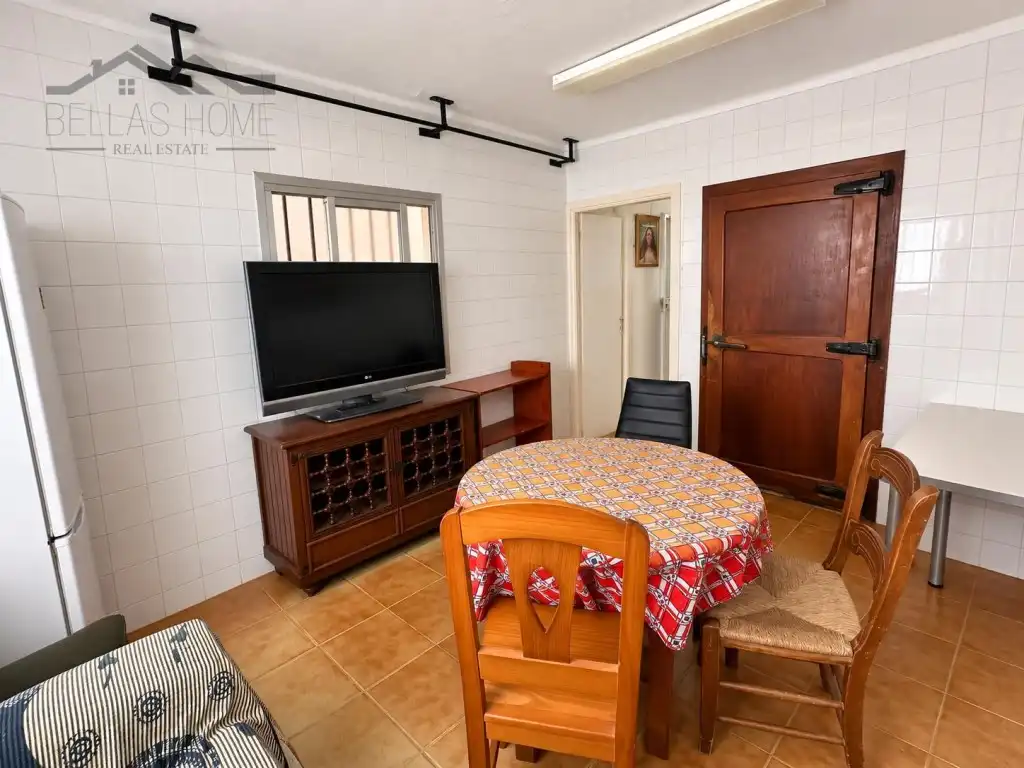 Sala d'estar de Casa adosada en venda en Estepona amb Moblat