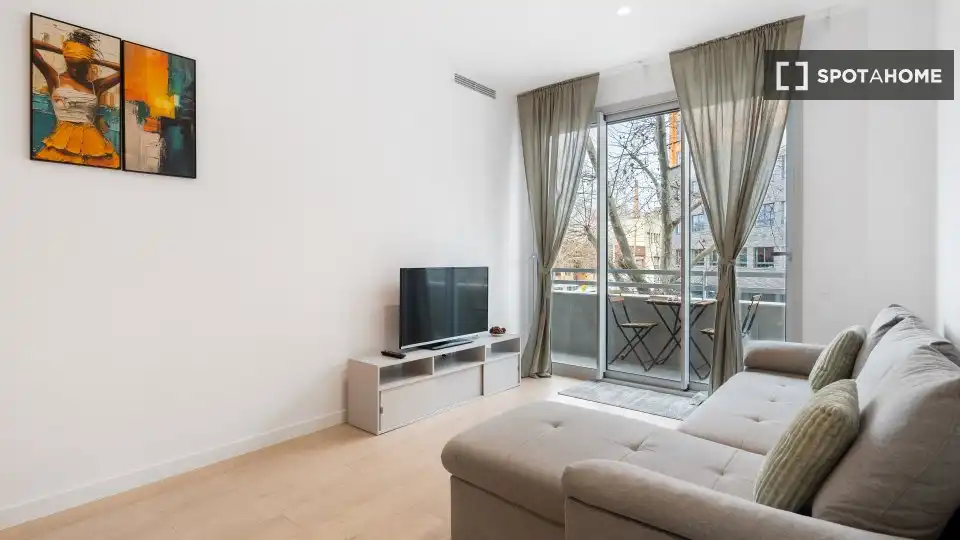 Sala de estar de Apartamento para compartir en Barcelona con Aire acondicionado, Terraza y Amueblado