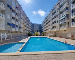 Swimming pool of Apartment for sale in Torrevieja  with Air Conditioner, Terrace and Storage room