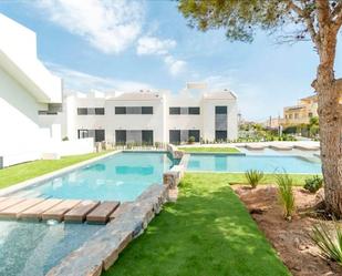 Exterior view of Single-family semi-detached for sale in Torrevieja  with Air Conditioner, Terrace and Community pool