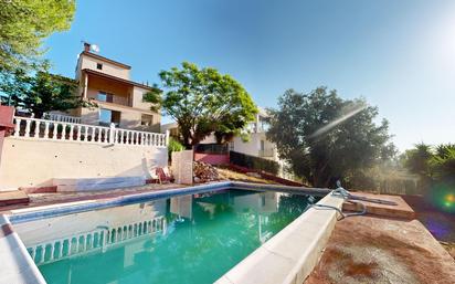 Swimming pool of House or chalet for sale in Chiva  with Air Conditioner, Terrace and Swimming Pool