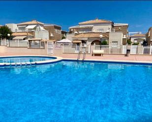 Swimming pool of Single-family semi-detached for sale in Torrevieja  with Air Conditioner, Private garden and Terrace