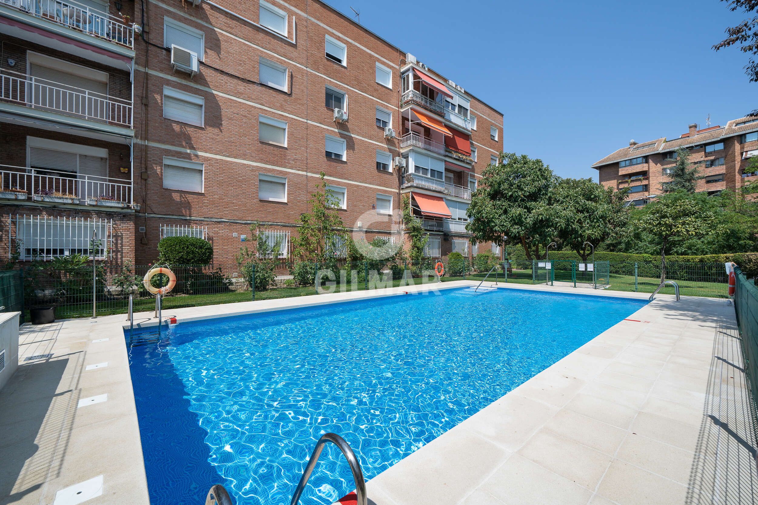 Swimming pool of Flat for sale in  Madrid Capital  with Heating, Private garden and Swimming Pool