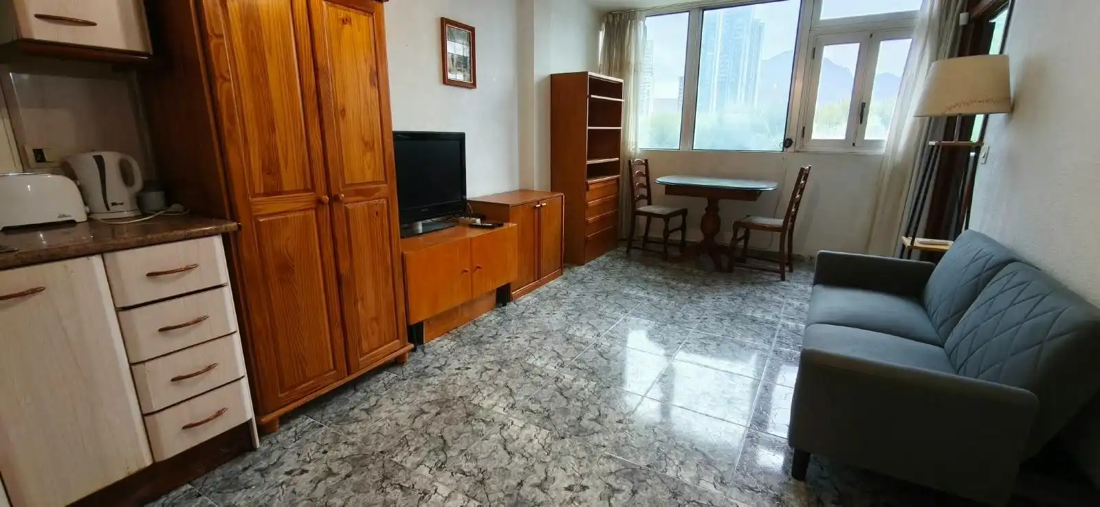 Living room of Flat for sale in Benidorm  with Air Conditioner, Furnished and Alarm