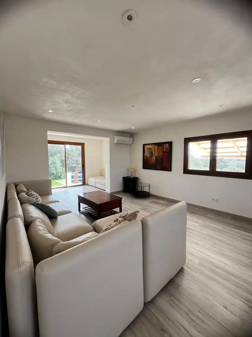 Sala de estar de Finca rústica de alquiler en Santanyí con Aire acondicionado, Calefacción y Terraza