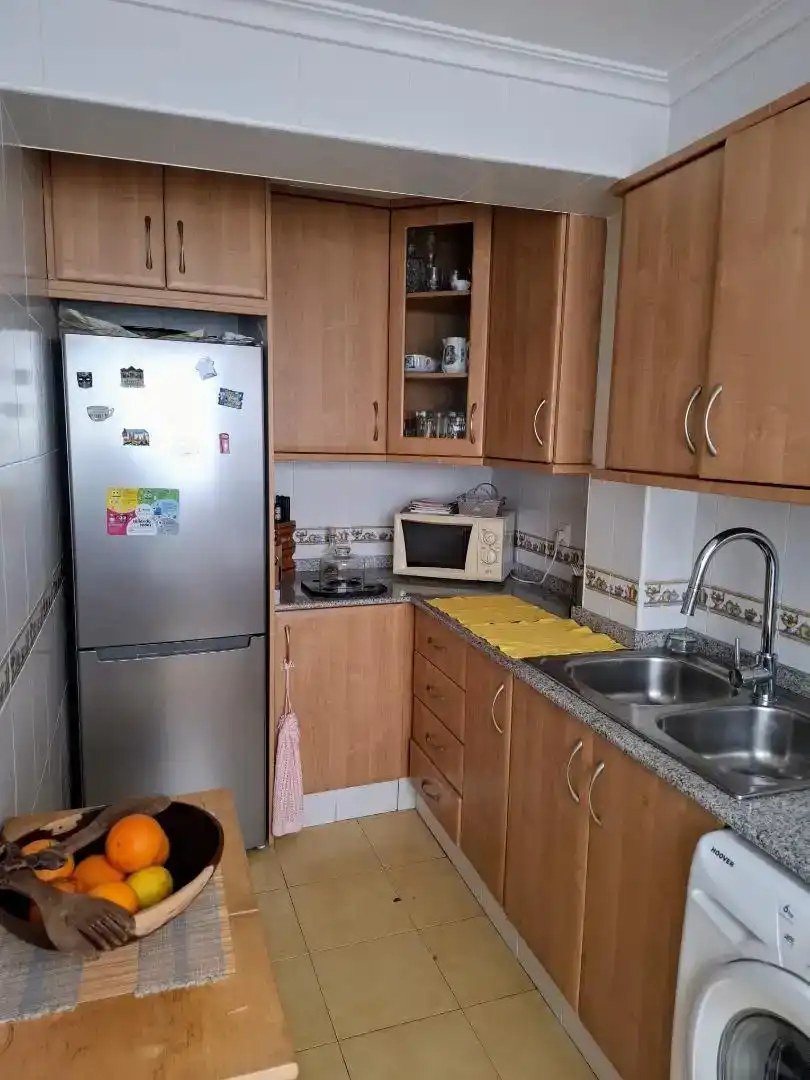 Küche von Wohnung zum Verkauf in Cullera mit Ofen, Waschmaschine und Balkon