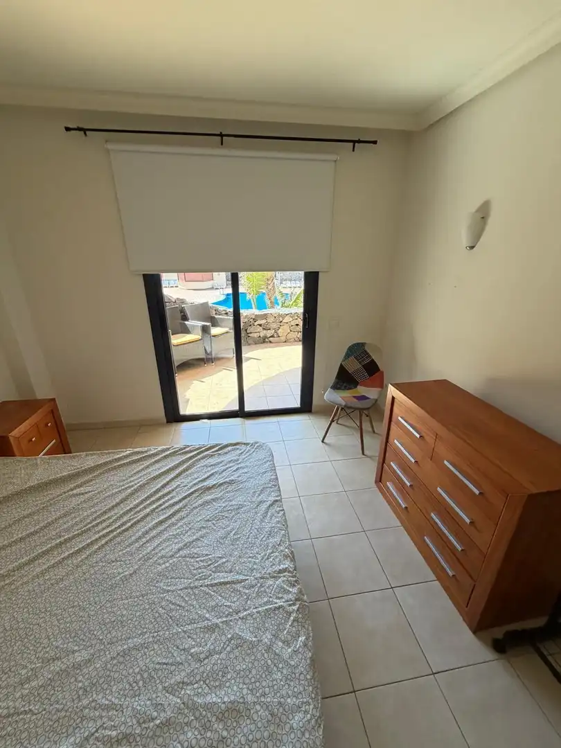 Dormitori de Pis de lloguer en Santiago del Teide amb Terrassa i Piscina comunitària