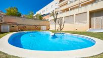 Swimming pool of Flat for sale in Cubelles  with Air Conditioner, Terrace and Balcony