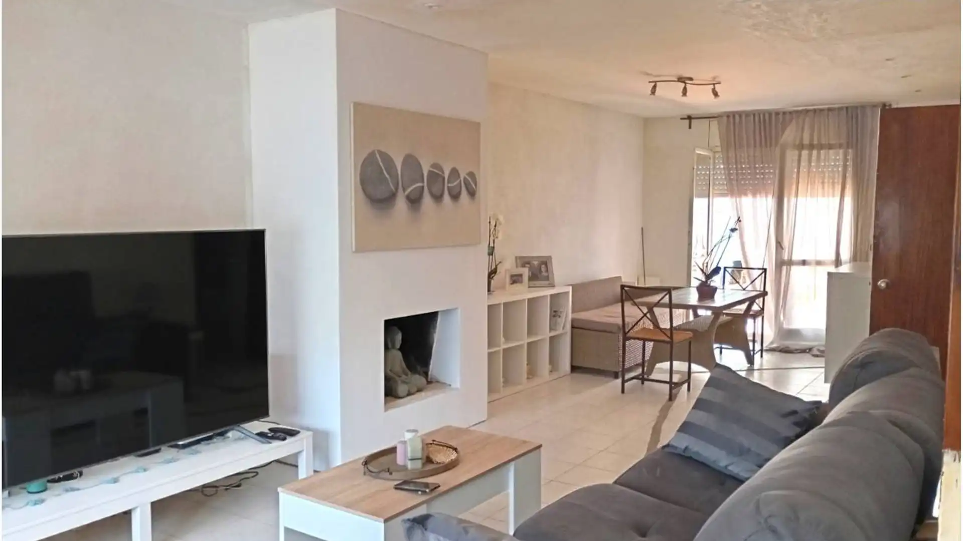 Sala d'estar de Casa o xalet en venda en Cunit amb Calefacció, Jardí privat i Terrassa