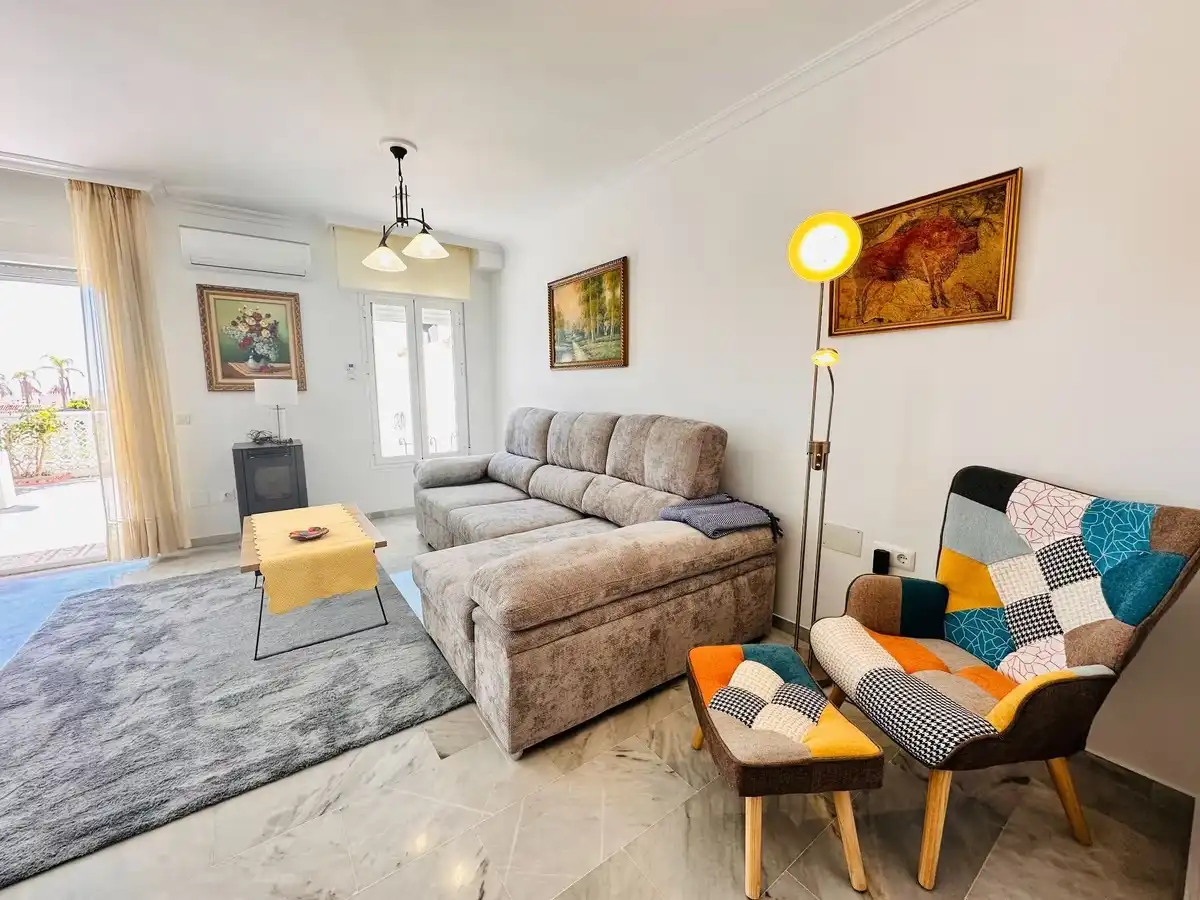 Sala d'estar de Casa adosada en venda en Vélez-Málaga amb Aire condicionat, Calefacció i Terrassa