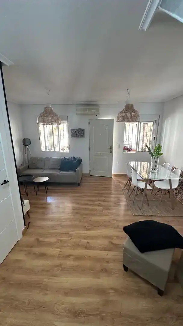 Sala d'estar de Casa adosada en venda en Orihuela amb Aire condicionat, Piscina i Balcó