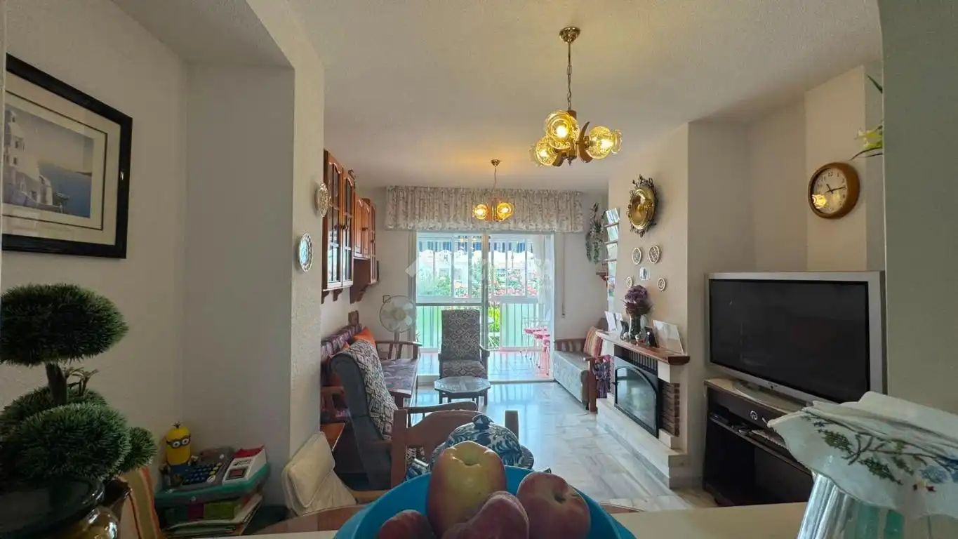 Sala de estar de Dúplex en venta en Motril con Terraza, Piscina y Piscina comunitaria