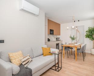 Living room of Flat for sale in  Madrid Capital  with Air Conditioner, Heating and Balcony