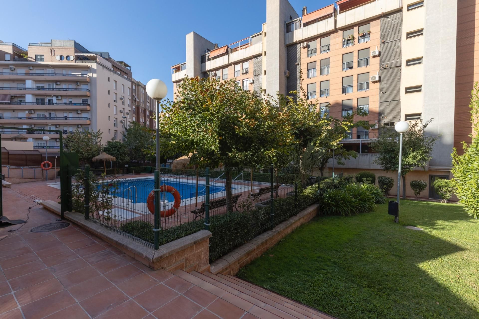 Swimming pool of Flat for sale in  Granada Capital  with Air Conditioner, Heating and Community pool