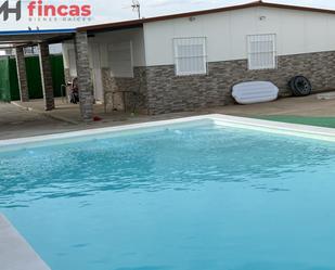 Swimming pool of Country house for sale in Dos Hermanas  with Air Conditioner, Storage room and Swimming Pool